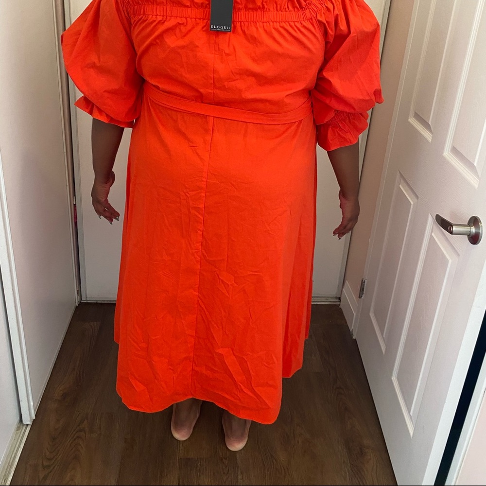 Beautiful orange colour dress in new condition